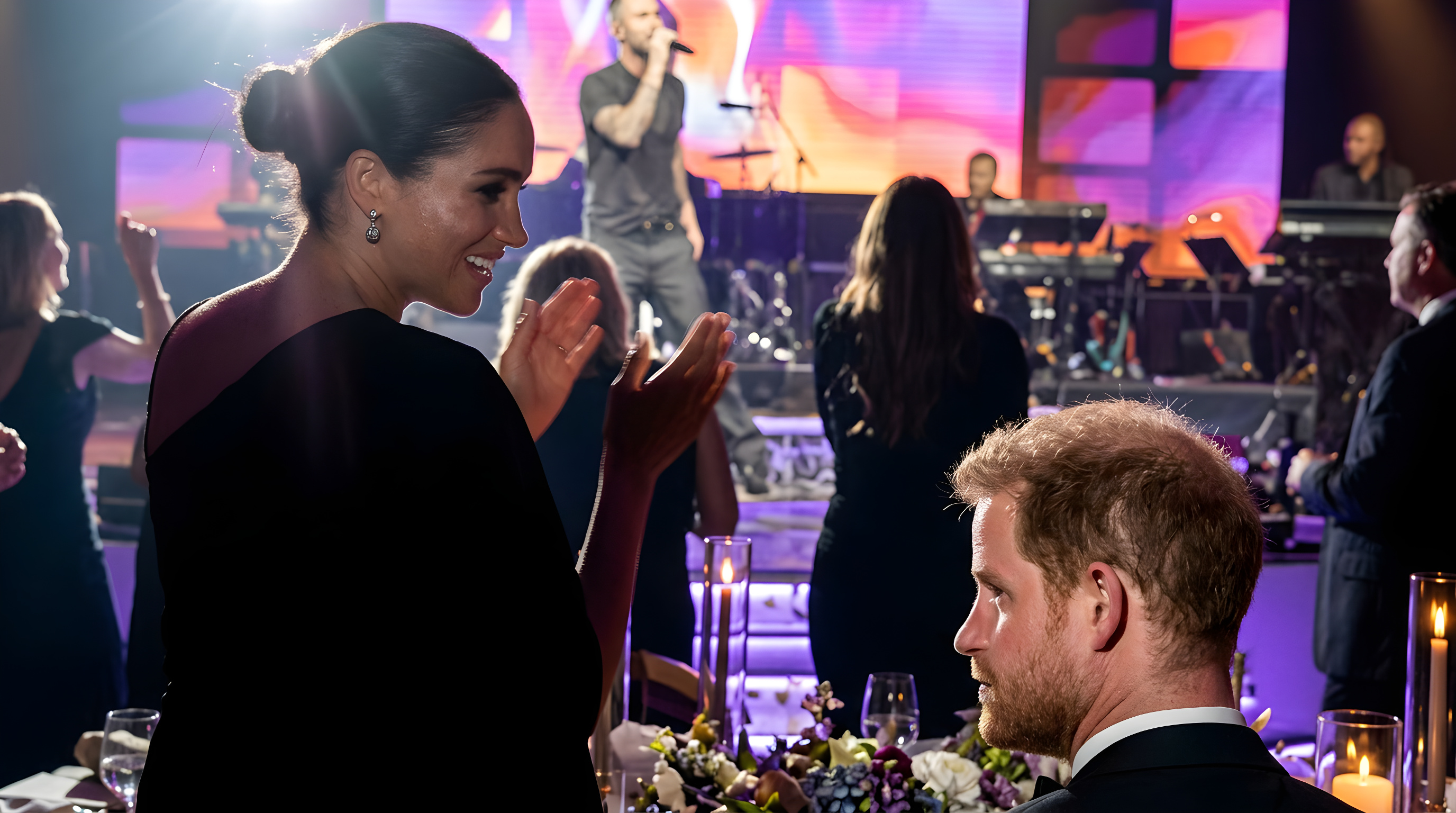 Meghan dansede til Maroon 5 mens Harry sad stille